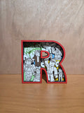 Game character "R" shelf sitter