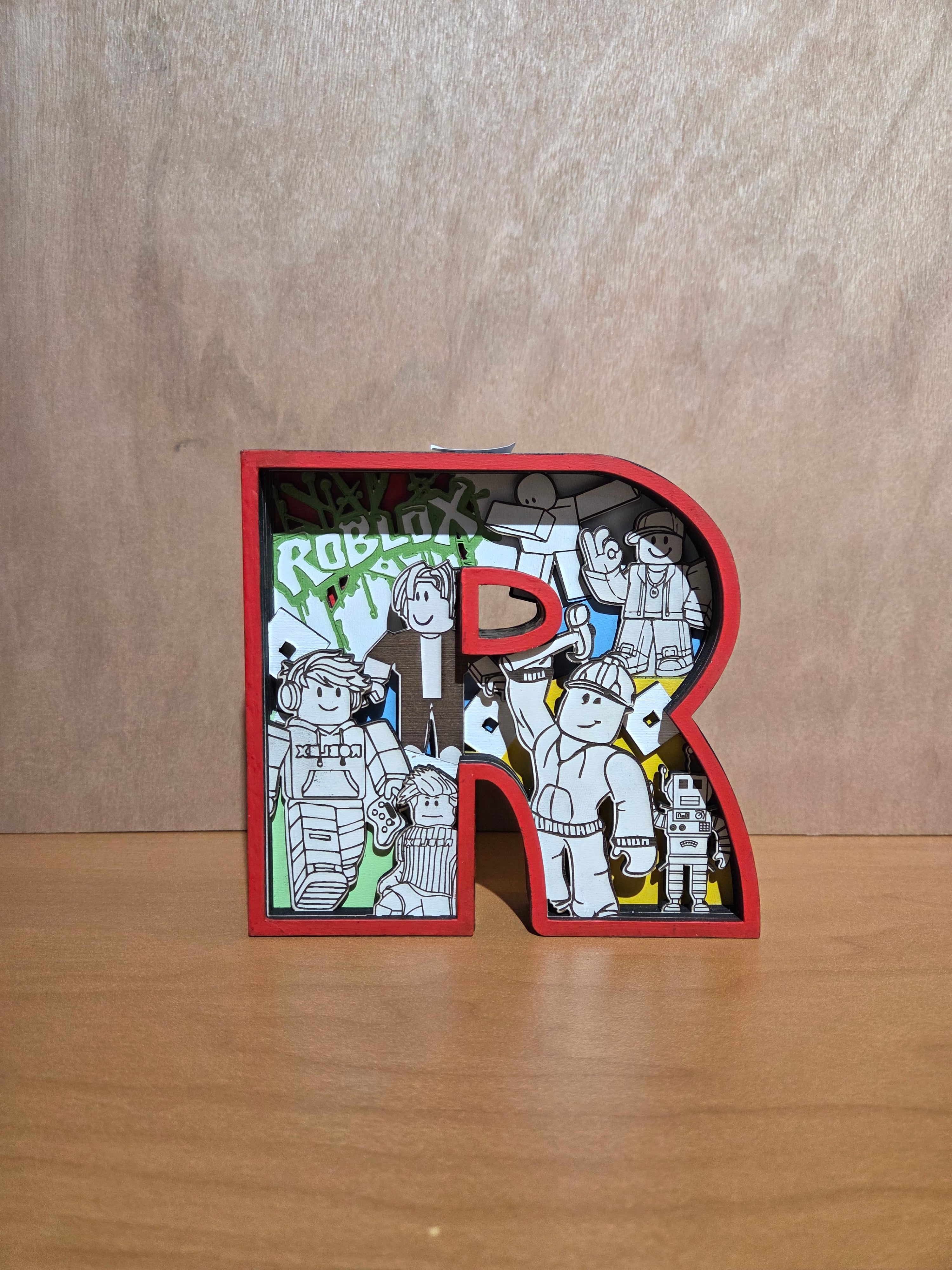 Game character "R" shelf sitter